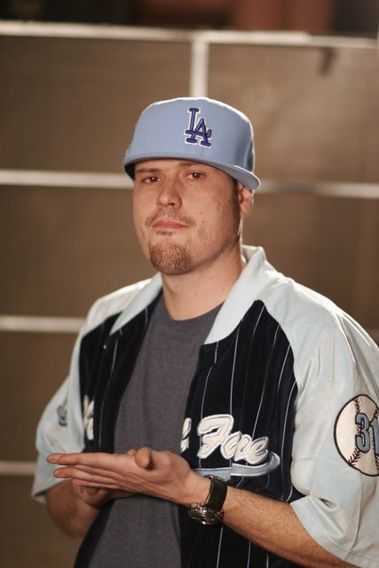 Man in Blue and White Baseball Jersey