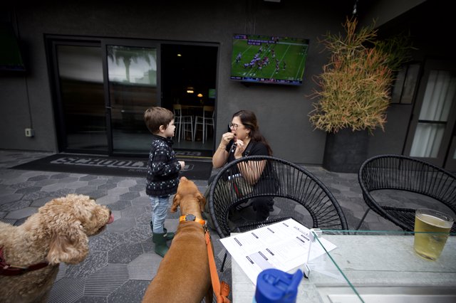Family Time with Dogs at Modern Outdoor Patio