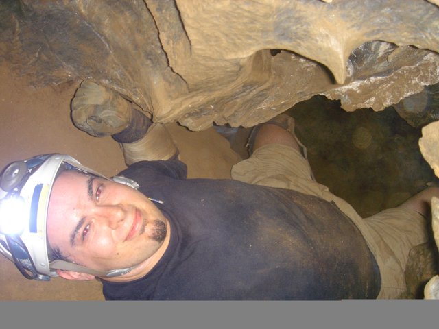 Cave exploration with protective headgear