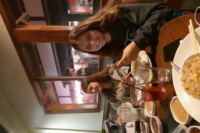 Friends Enjoying Asian Dinner Together