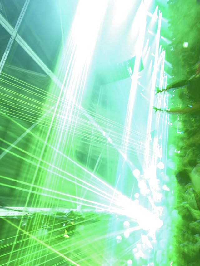 Explosive Green Laser Light Show at Electronic Music Concert