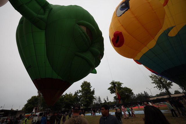 Giant Character Balloons Face Off at Festival