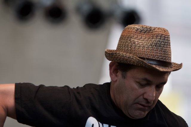 Hatted Man at Ozomatli Performance