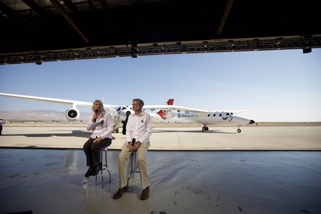 Branson and Rutan Discuss White Knight Two in Front of Airplane