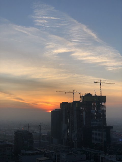 Golden Sunset over a Growing Metropolis