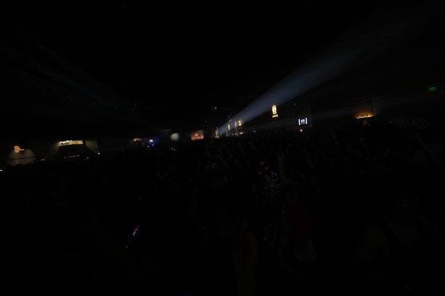 Dark Crowd Surges Under Spotlight Beam at Wobbleland