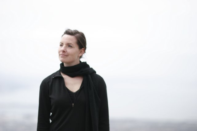Contemplative Portrait by Misty Coastal Waters