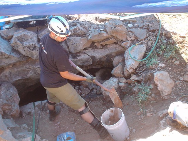 Man excavating an archaeological site