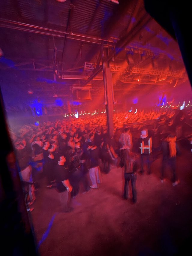 Red and Blue Lit Concert Crowd from Above