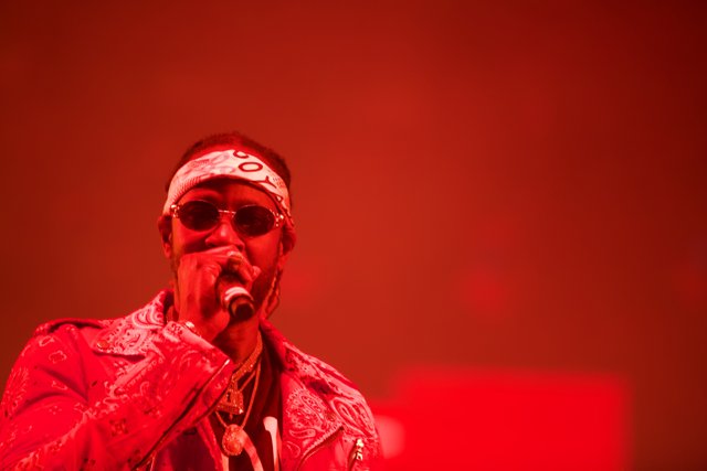 Red Jacket and Sunglasses: A Solo Performance at Coachella