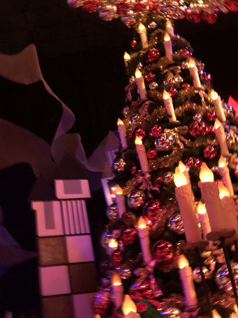 Festive Christmas Tree with Eight Lit Candles