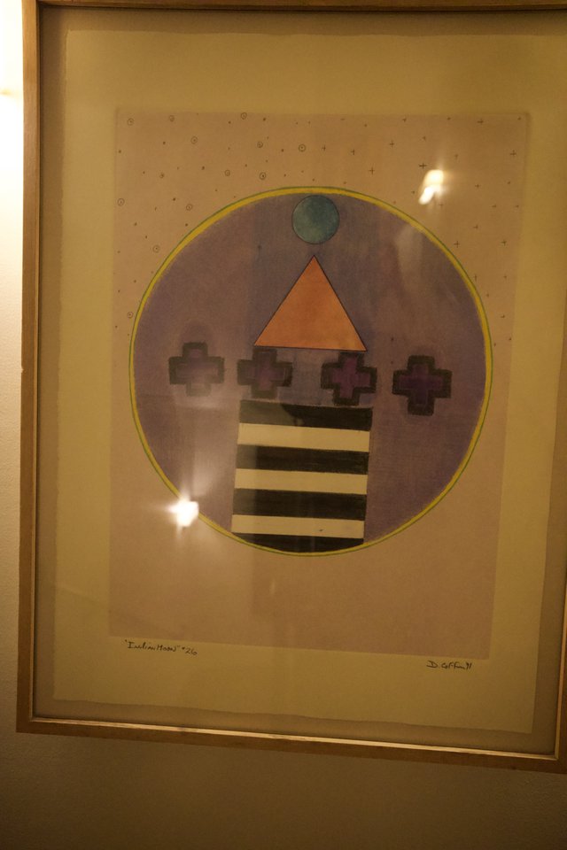 Geometric Abstract Artwork with Circle and Striped Vase