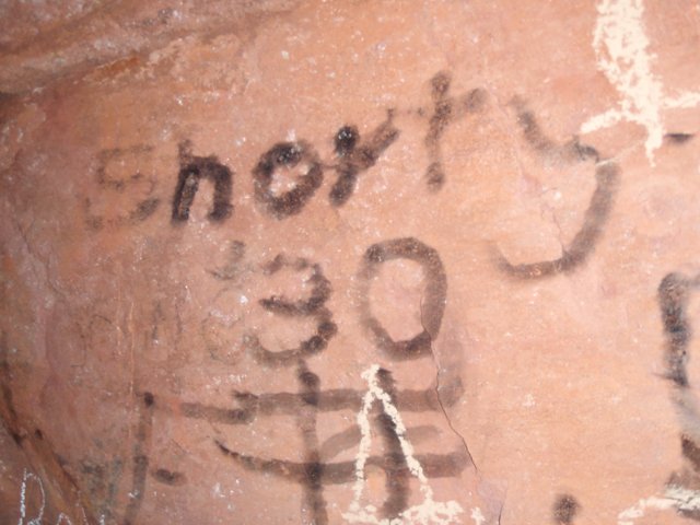Graffiti on the ancient rock wall
