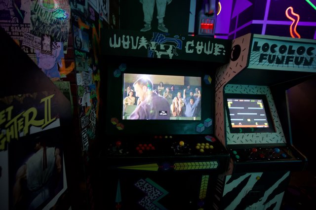 Retro Arcade Bar with Vintage Games and Neon Lights