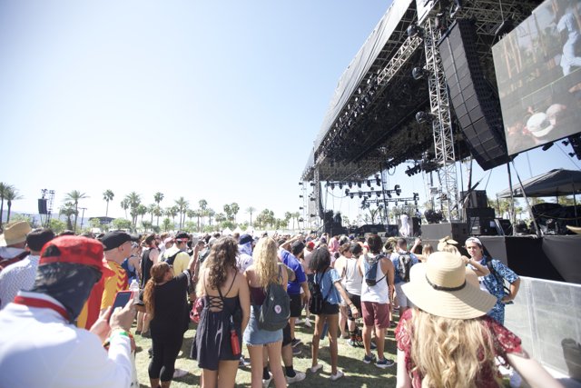 Coachella Crowd Grooving Under the Blue Sky