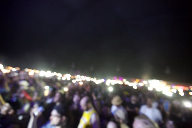 Blurry Night Sky Concert Crowd