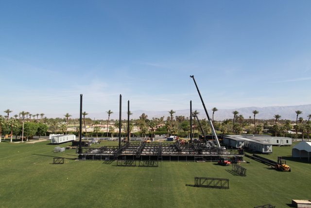 Stage set up in the middle of a grassy field