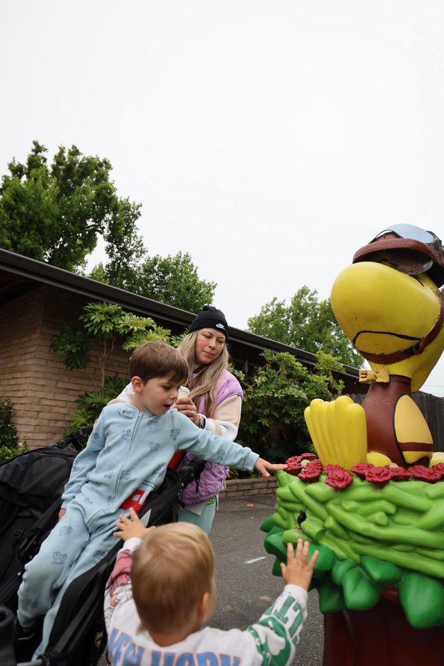 Children Marvel at Woodstock Balloon Float Decoration