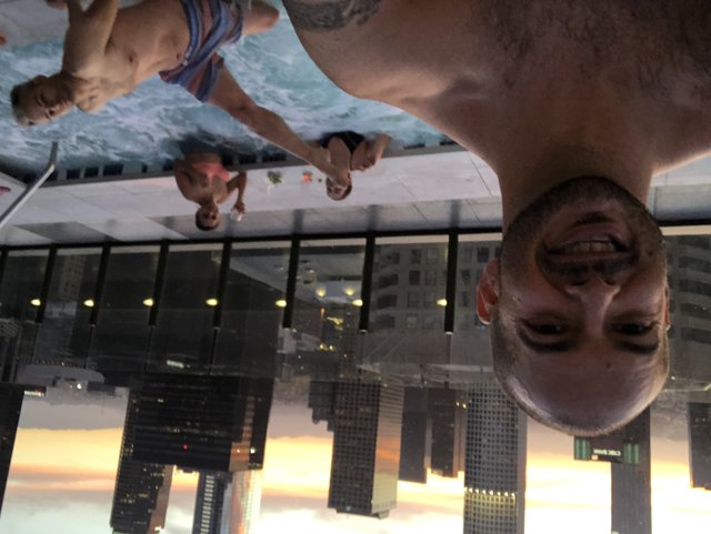Poolside Selfie with a View of the City