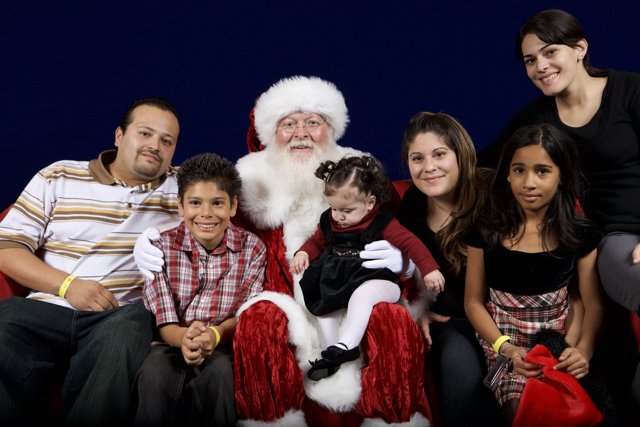 A Family's Festive Photo Opportunity with Santa Claus