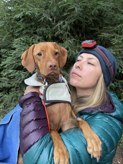 Blue Jacket, Blue Hat, and a Furry Friend
