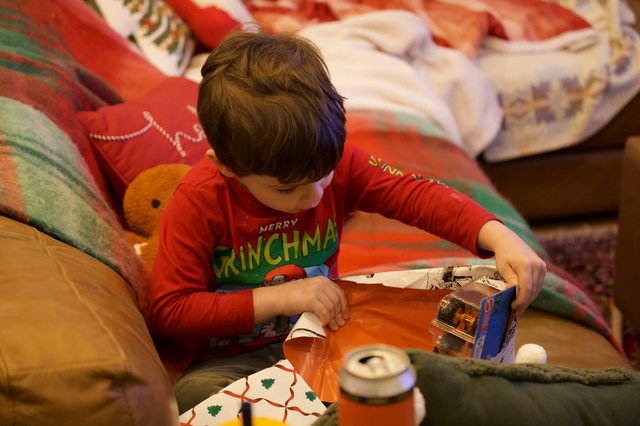 Christmas Morning Gift Opening with Young Child