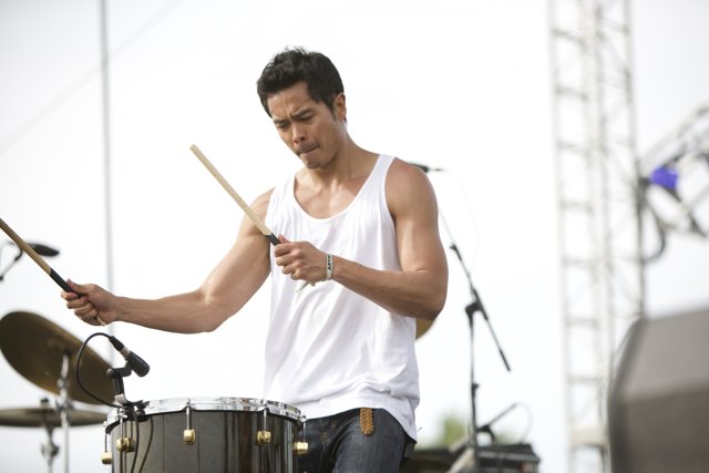 Drumming to the Rhythm: A Man's Musical Performance