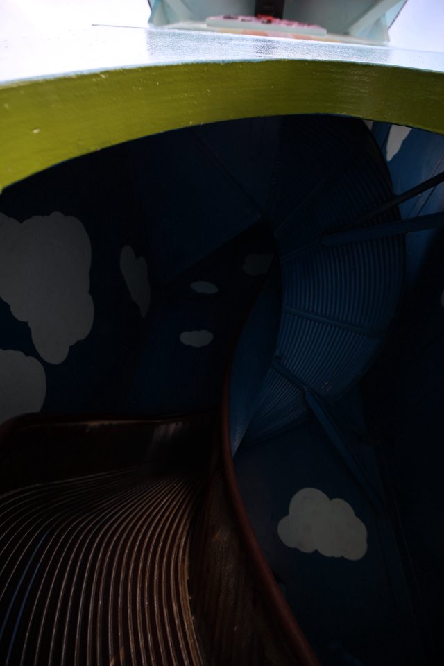Underneath Dumbo's Yellow Wing at Fantasyland