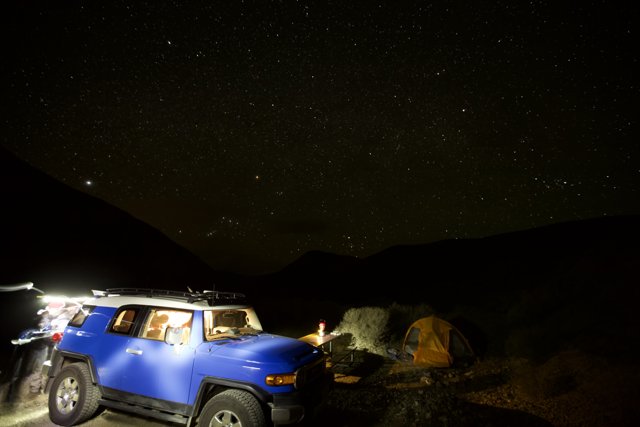 Camping under the stars with Blue Jeep