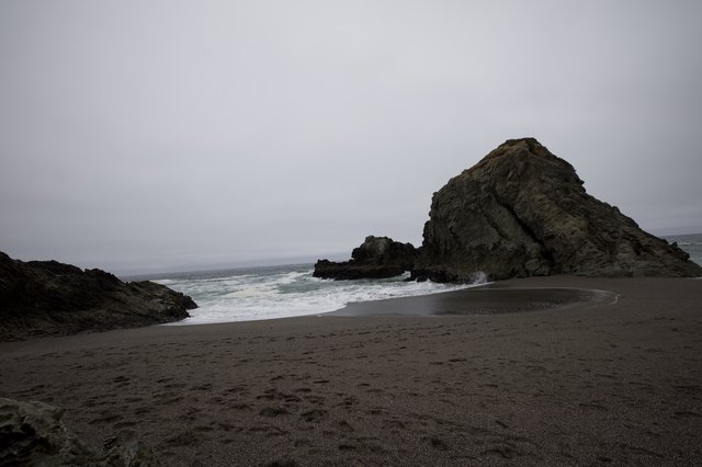 Moody Cove at Dusk with Dramatic Sea Stack