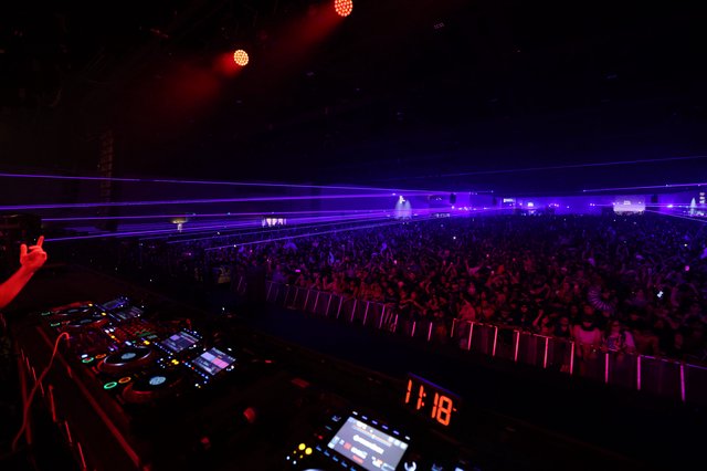 Massive Crowd Engulfed in Purple Laser Light at Wobbleland