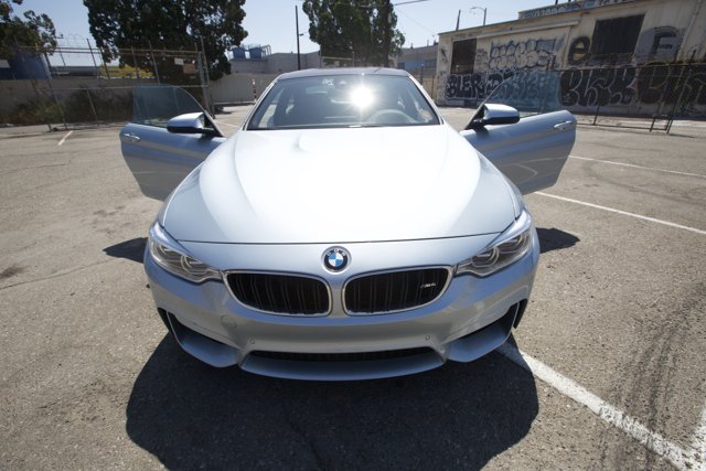 Sleek BMW M4 Parked in a Sunny Lot