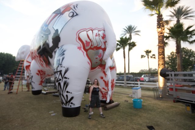 Man and Giant Inflatable Pig at Coachella