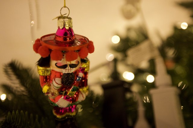 Colorful Nutcracker Christmas Tree Ornament with Bokeh Lights