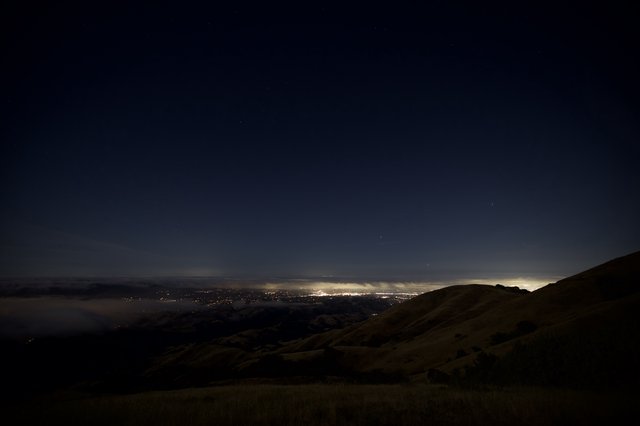 City Lights Glow Beneath Starry Skies Over Bay Area