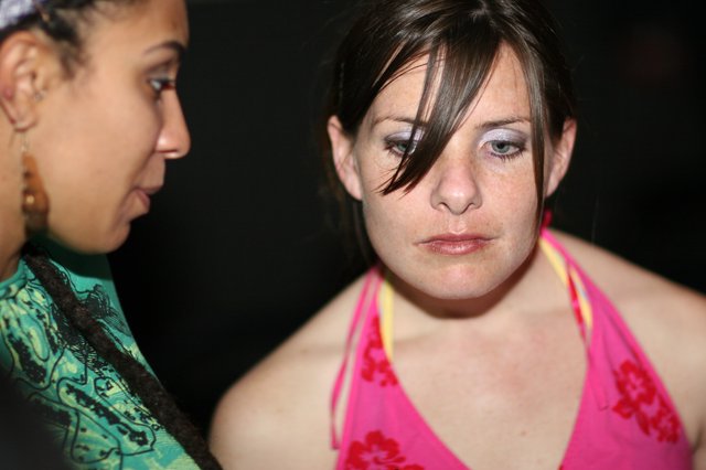 Two Women Share an Intimate Moment at Night