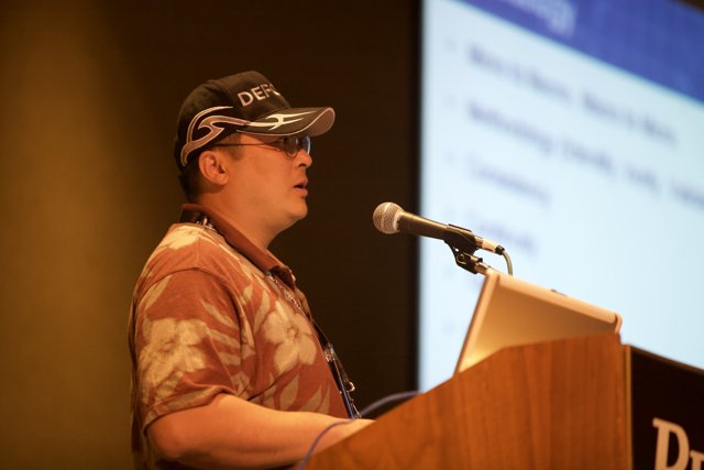 Speaking Engagements with Hat and Glasses