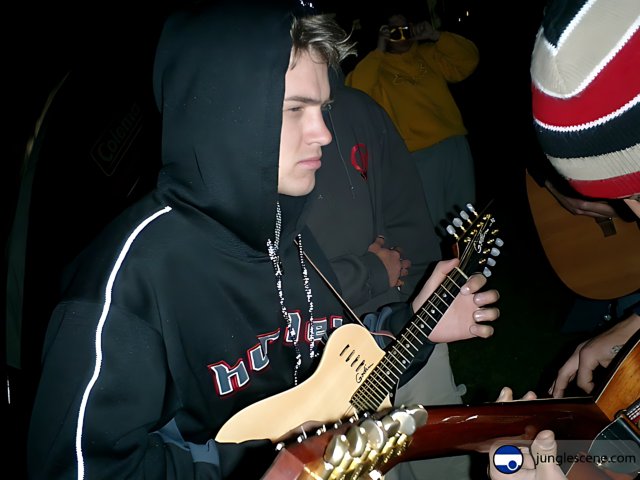 Guitarist in a hoodie