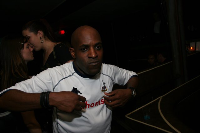 Tottenham Fan Commands Attention at Nightclub Event