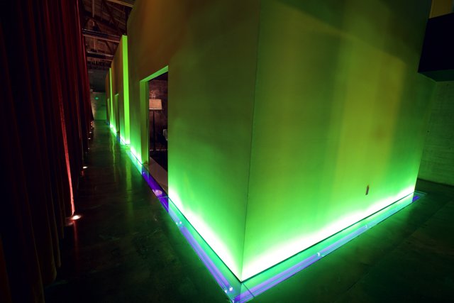 Glowing Green Wall in Corridor