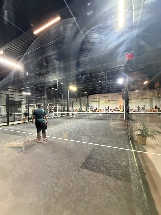 Indoor Padel Tennis Court with Glass Walls and Modern Design