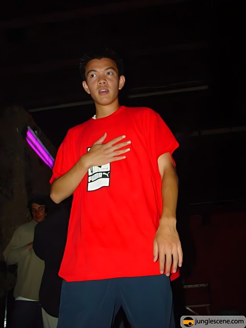 Portrait of a Teen Boy in a Red T-Shirt