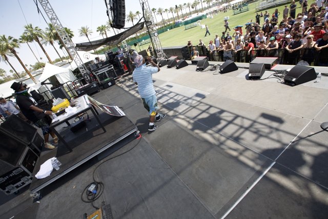 Man on Stage Performing at Coachella Music Festival