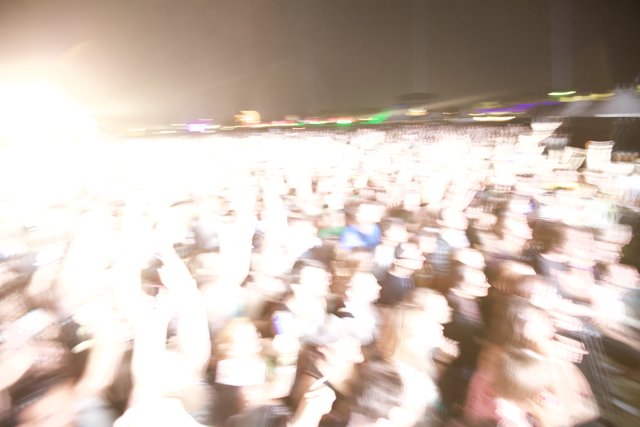 Blurry Lights and Faces in the Concert Crowd