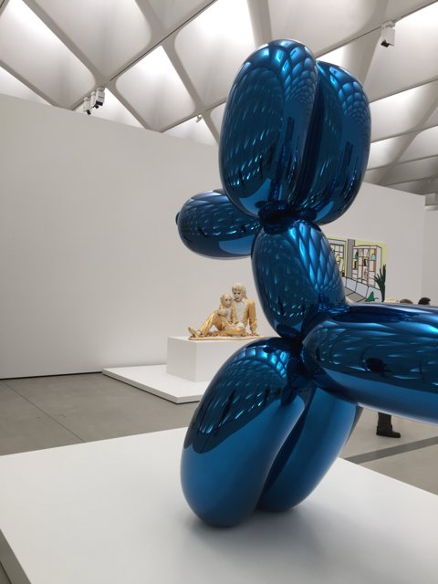 Blue Balloon Sphere Takes Center Stage in Art Museum