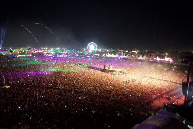 Electrifying Concert Crowd Under the Night Sky