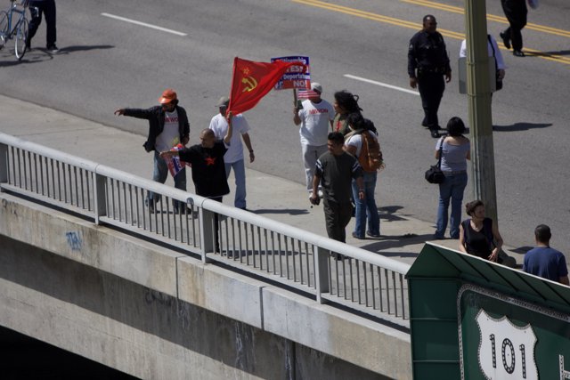 Mayday Rally Protesters with Flags on Bridge