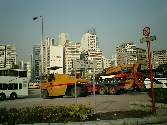 Construction Vehicle in Front of Office Building