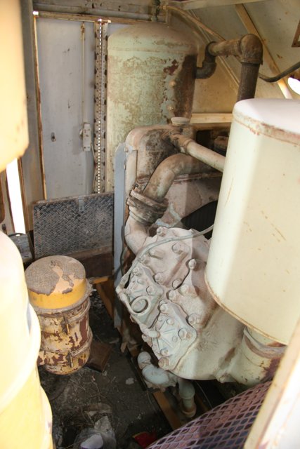 Rusty Engine in Abandoned Room
