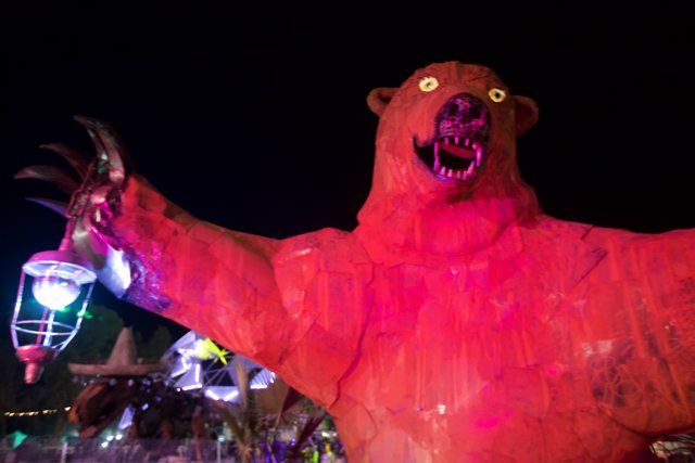 Glowing Bear Statue in the Night Sky